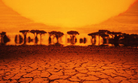 Kenya, mirage in desert, sunset
